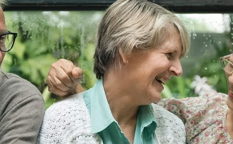 older woman laughing