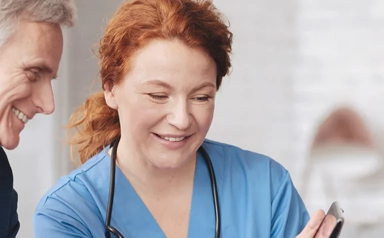 smiling doctor and patient