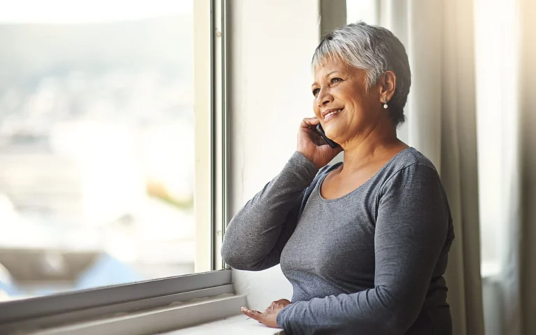 smiling older woman on phone
