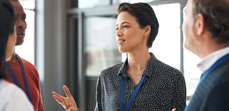 woman speaking at trade show