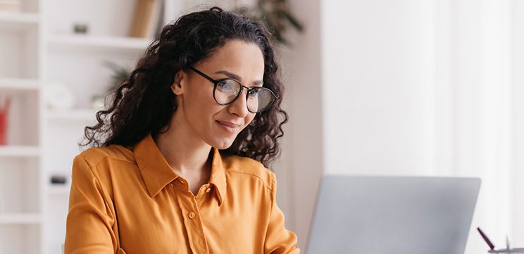 woman using computer to schedule appointment online