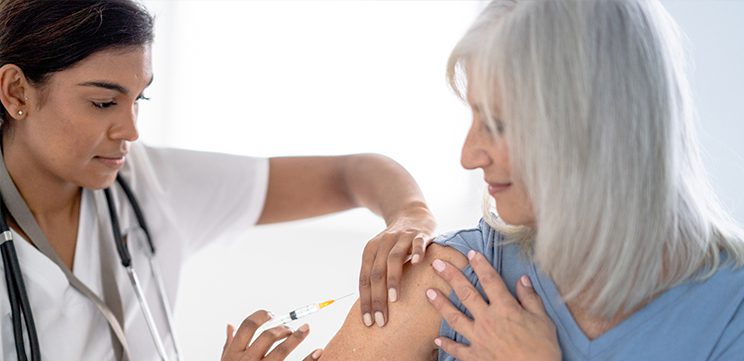 woman receiving flu shot