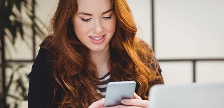 young woman using mobile phone