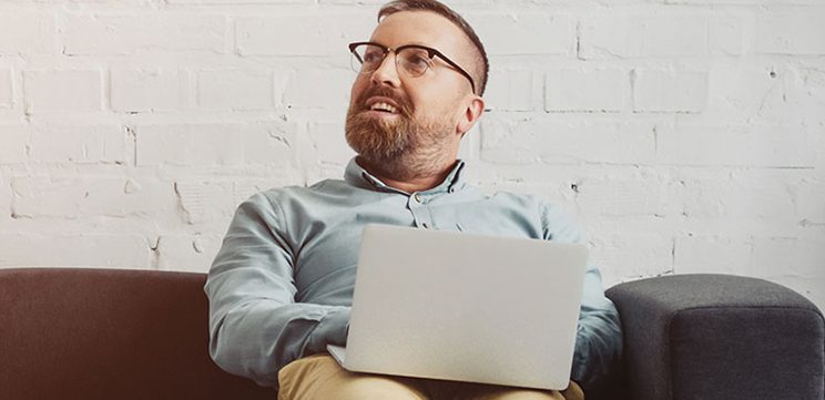 man using laptop to receive message