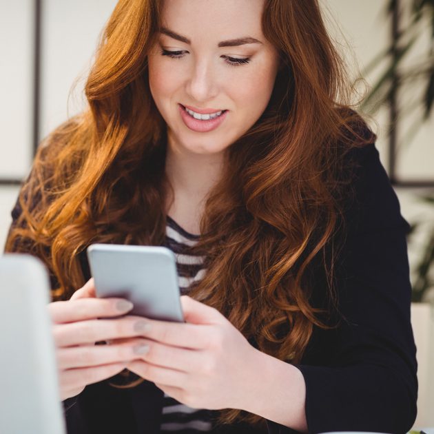woman contacting medical call center with mobilel phone
