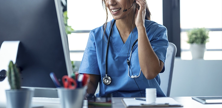 medicare nurse on computer