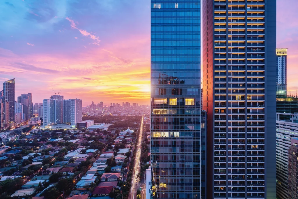 Makati City business district skyline at sunset, Philippines — Carenet Health farshore healthcare outsourcing location